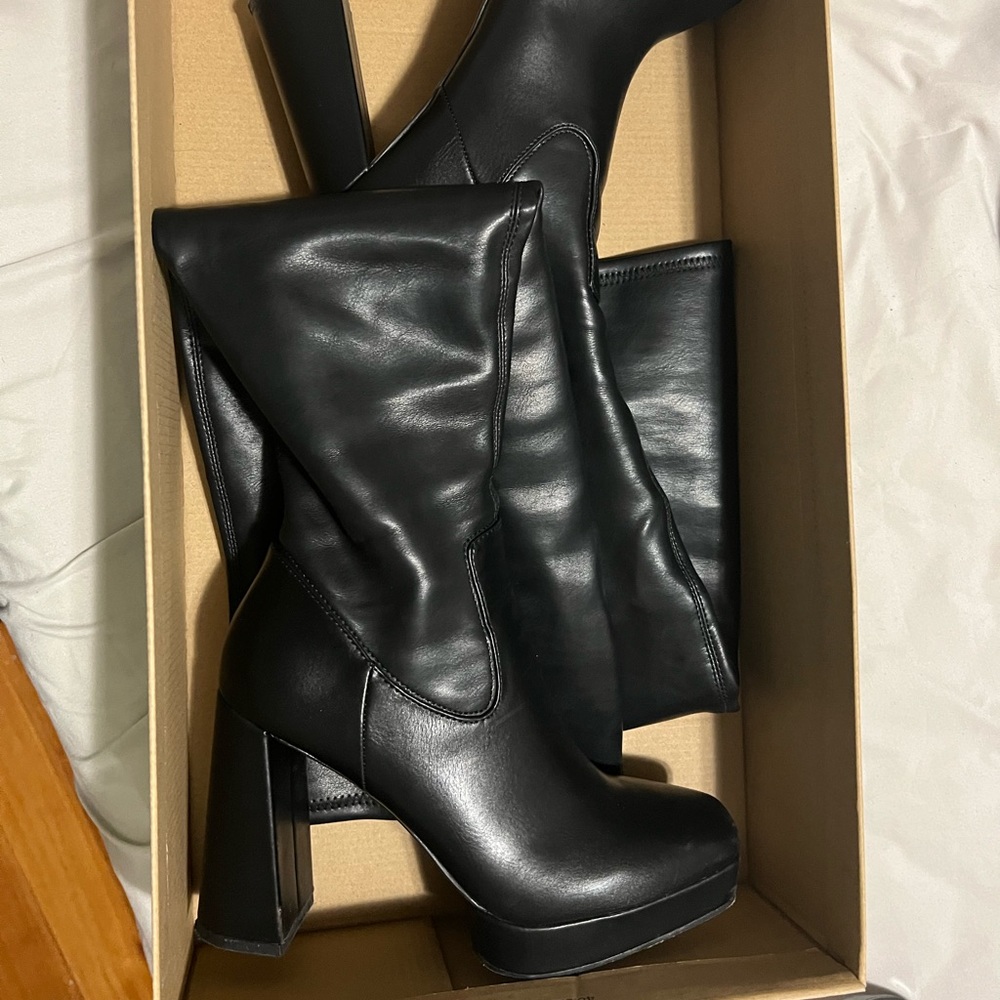 Thigh high leather boots